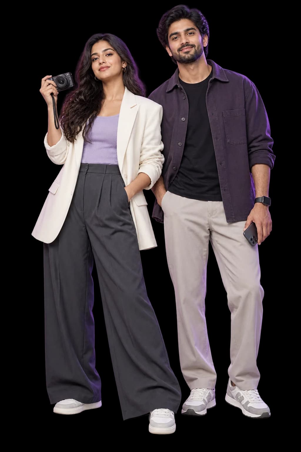 Two creators standing together, one holding a camera and the other a phone